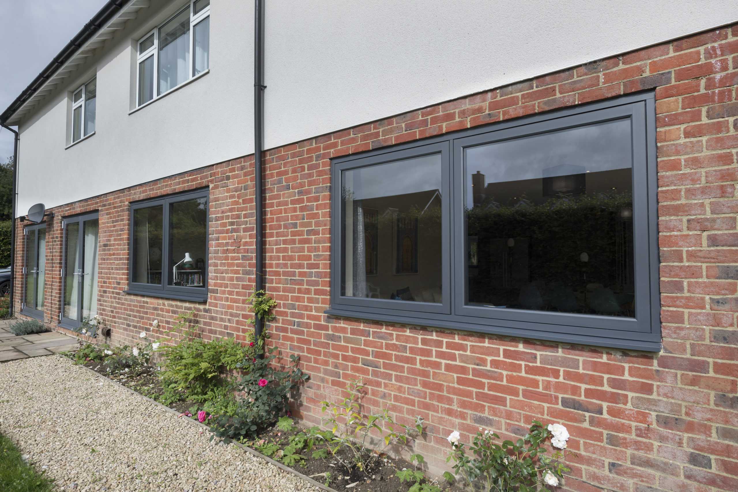 Residence 7 Windows on a red brick wall